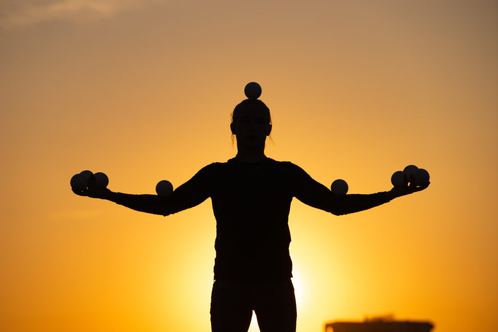 Juggler with balls captured and balanced representing LiquidPlanner