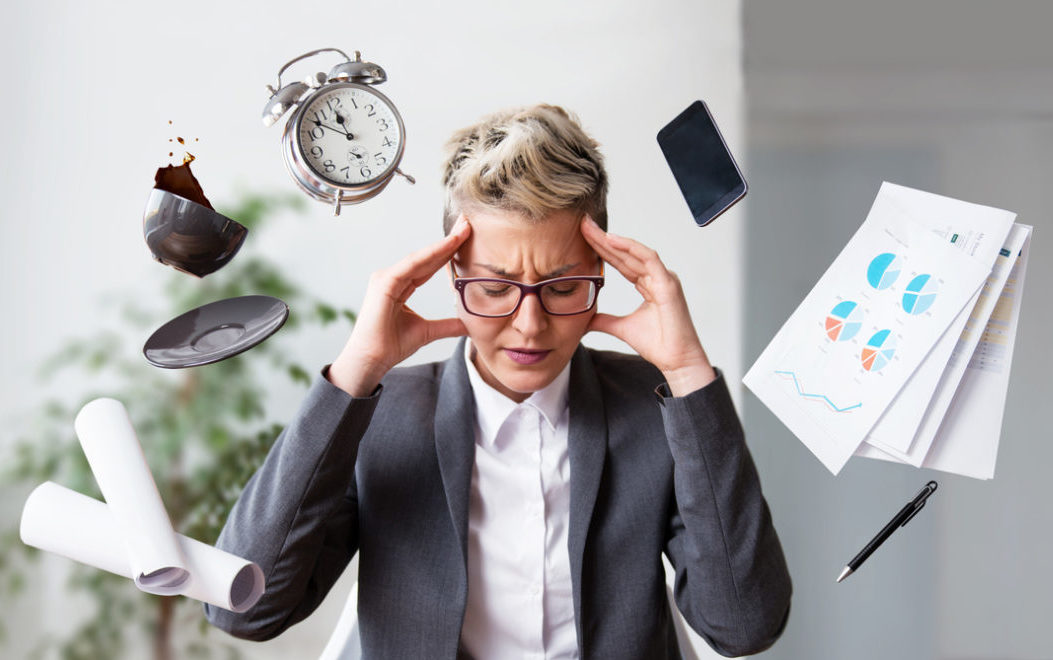 business woman feeling Overwhelmed at work
