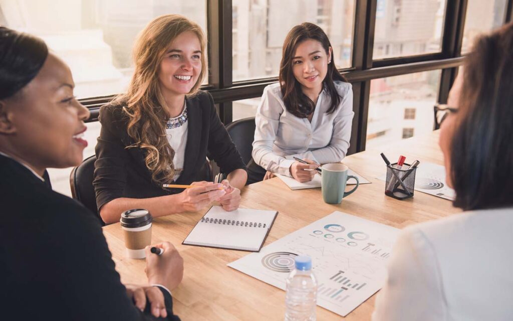 female project managers getting team lead feedback