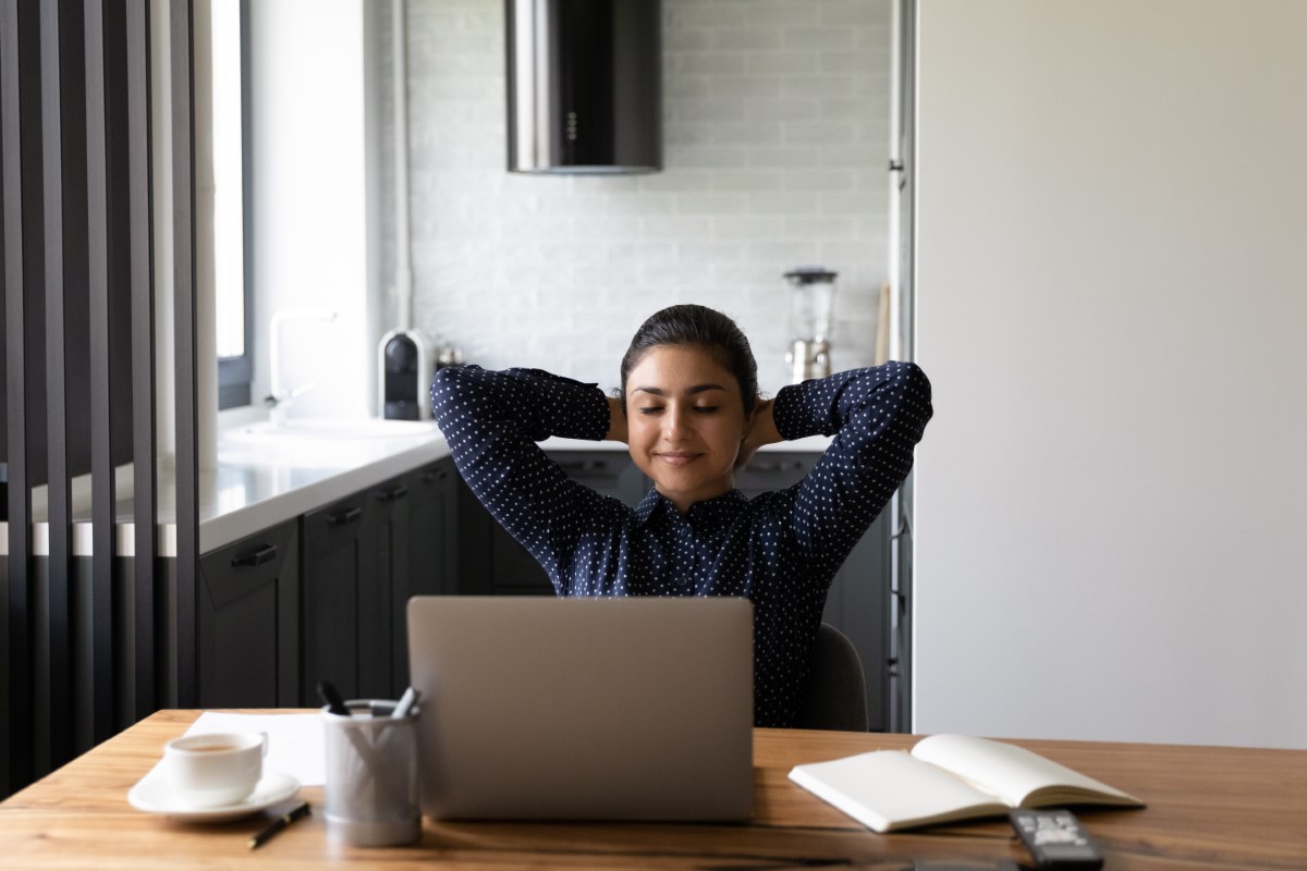 relaxed employee leaning back in chair